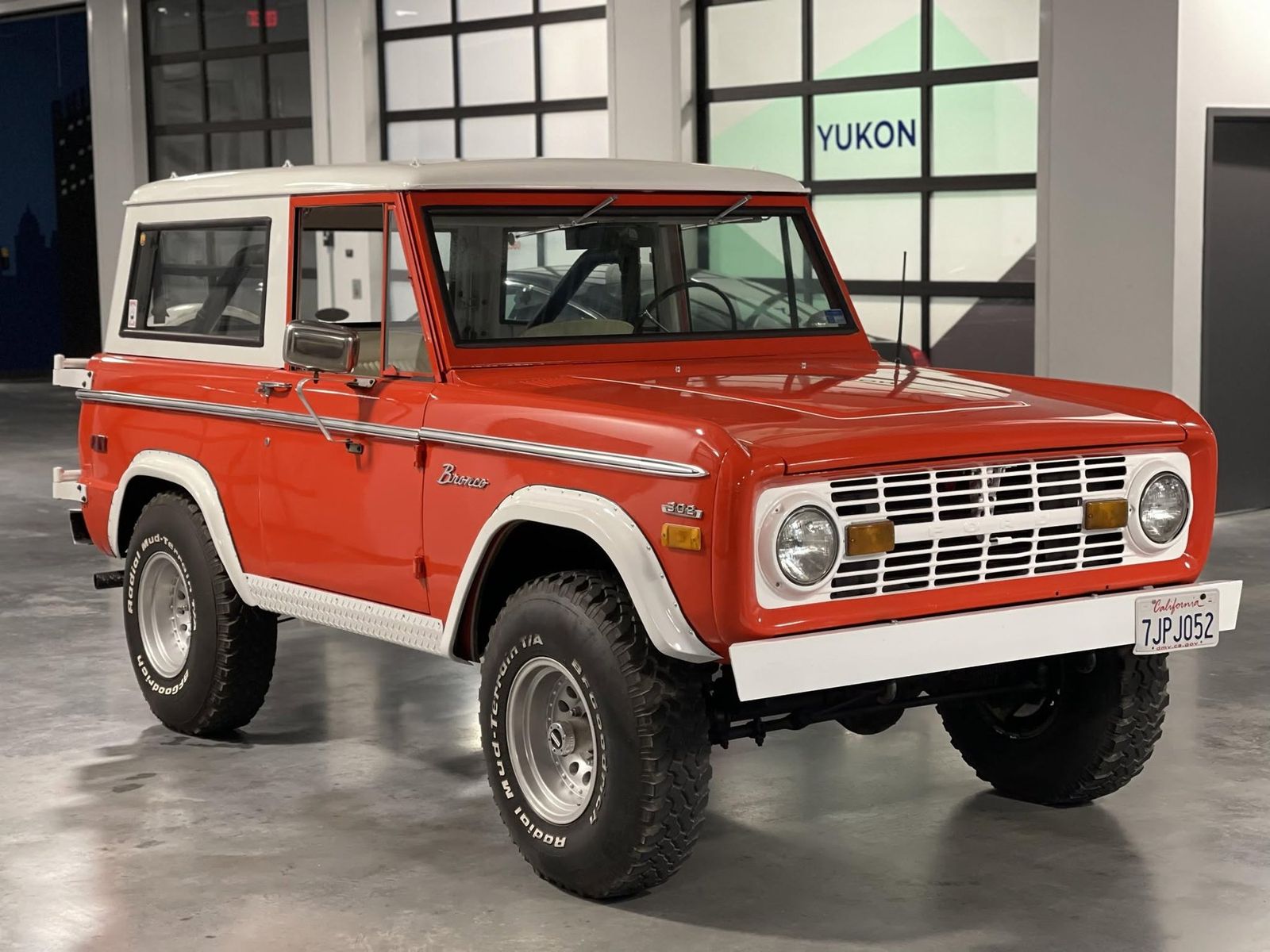 Red and white early Ford Bronco
